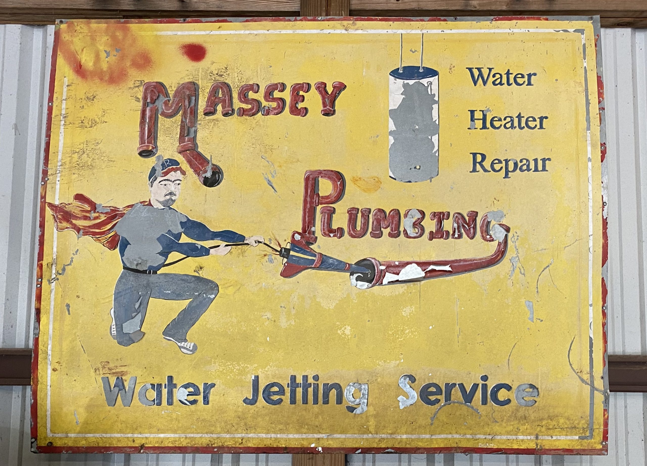 old Massey Plumbing Inc sign